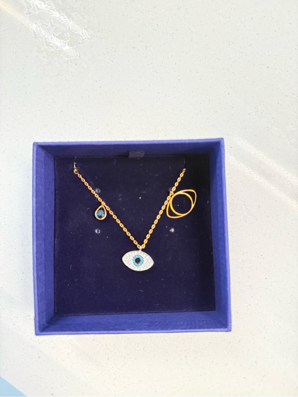 Swarovski Gold and Blue Evil Eye Pendant Necklace with Teardrop Accent